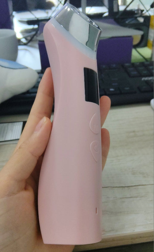 Skinovia Microcurrent Facial Wand in use