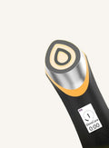 Skinovia Microcurrent Facial Wand on ivory background
